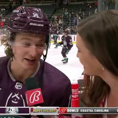 Ducks reporter Aly Lozoff asking Zegras for a Michigan as a Christmas present during pre-game warm ups
