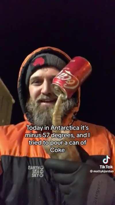 to pour a can of coca cola in Antarctica.