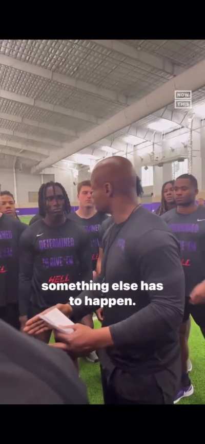 Coach giving consent talk to his players.