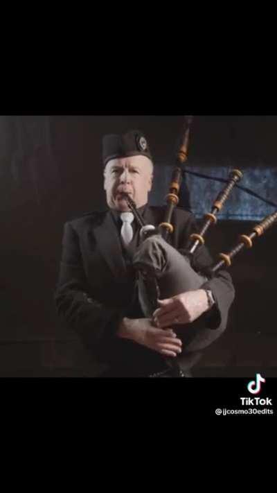 Bagpipe plays national anthem.