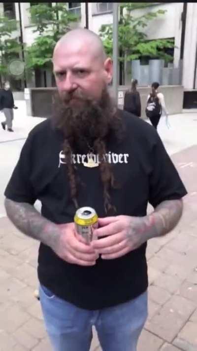 [canada Nazi] bonehead petrified when a couple nerds on bikes confront him about his t shirt that celebrates what the little baby nazis did. Look in his coward eyes hahahaha