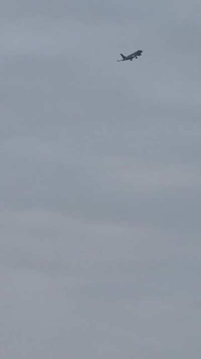 2 guys freaking out when they notice a plane in trouble and the film it crash.. 