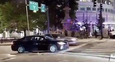 Police in Denver shoot car uninvolved with protests with pepper bullets. Man gets out to yell at police because his pregnant wife was inside the car, police respond with more fire.