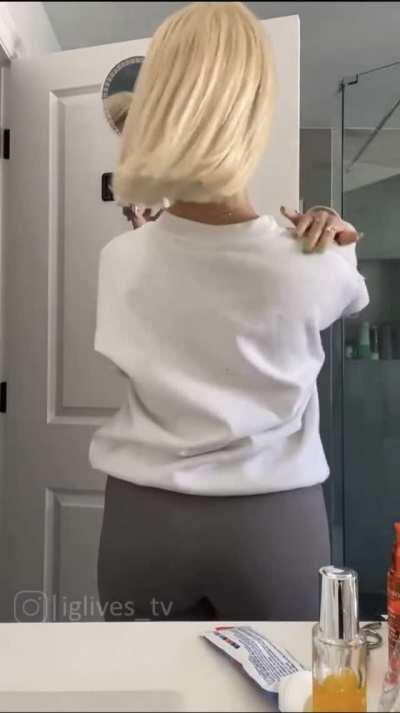 “Fixing her hair”