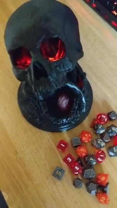 [Art] [OC] I 3D printed this skull dice tower and integrated LEDs into the eyes to make them glow! Made this for my secret santa.