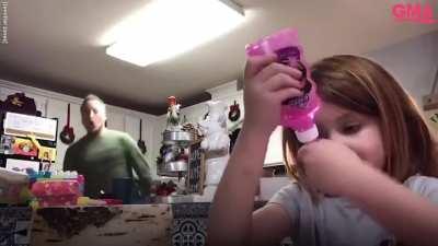 Dad hysterically dances as the daughter does art and craft for virtual school