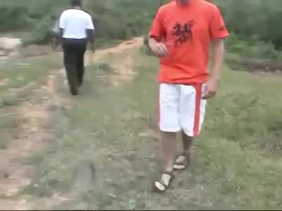 A tourist traveling in Cambodia attempted to experience a grenade at a shooting range, but his hand slipped while throwing it into a pond