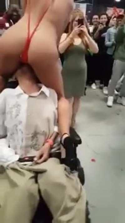 Adriana Chechik giving a disabled fan a taste and the time of his life