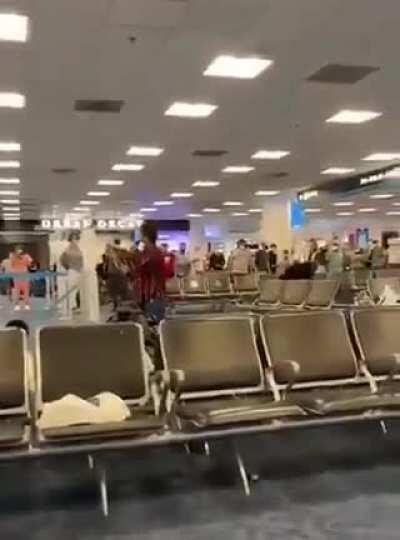A mass brawl broke out at the Miami International Airport