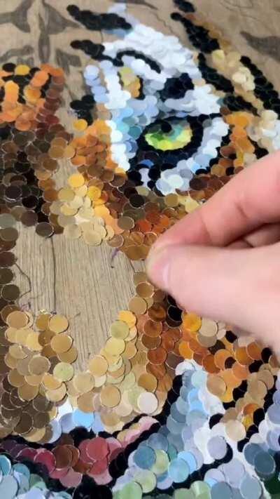 Making art with hole-punches [by marweinnn]