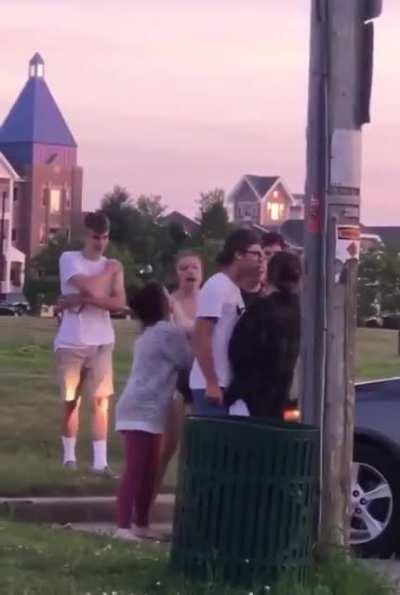 Kenosha shooter Kyle Rittenhouse (red white and blue shorts) punches a woman in the back of the head and she doesn't even notice. Now we know why he needed a gun.