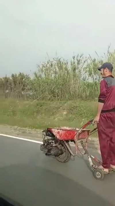 Where there's a wheel, there's a way. His wardrobe is also on point. [Loose Fit]