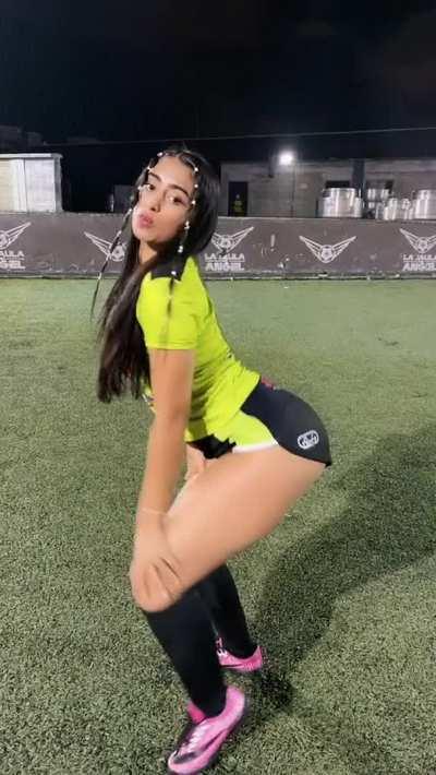 A girls who likes to play with balls