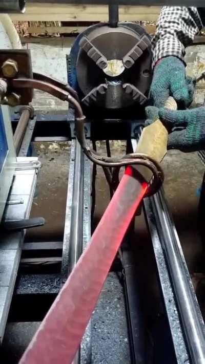 An example of induction heating being used to forge a sword