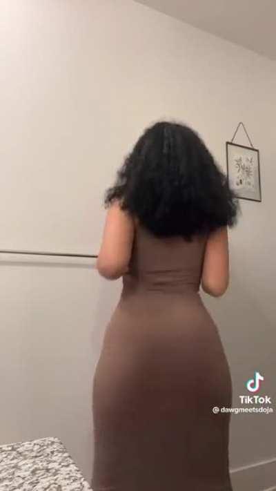 Dress sticking to her