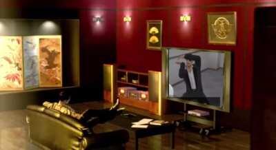 Majima watching his old home movies