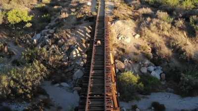 I mean, who doesn't use a drone to record themselves riding a dildo on abandoned train tracks!?
