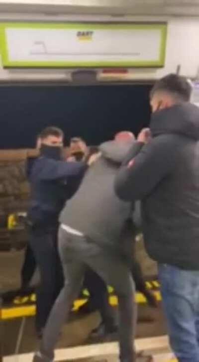 Teens throwing bottles at the Irish police get arrested.