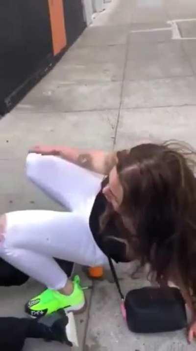 Homeless guy puts his hands on drunk lady for peeing outside the building he sleeps around 💀