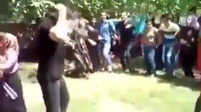 Pakistan man dancing holding an AK accidentally riddles bystander with bullets at point blank range.