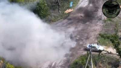 (GRAPHIC)Drone footage shows Russians struck explosive projectile while in a white car (Full part 1 and 2 )