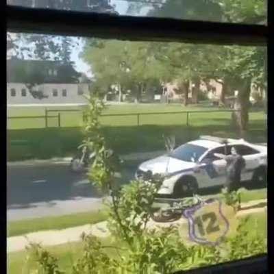 Popping a wheelie in front of the police WCGW