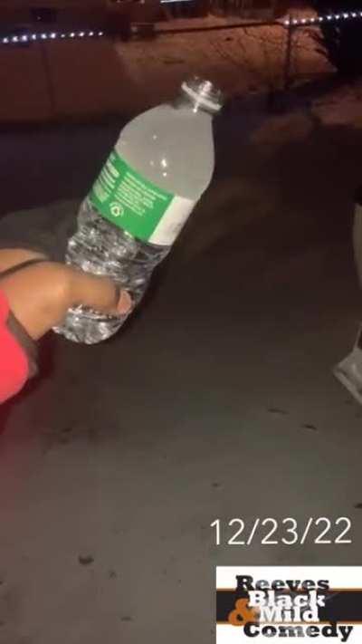 Pouring water in a very cold weather