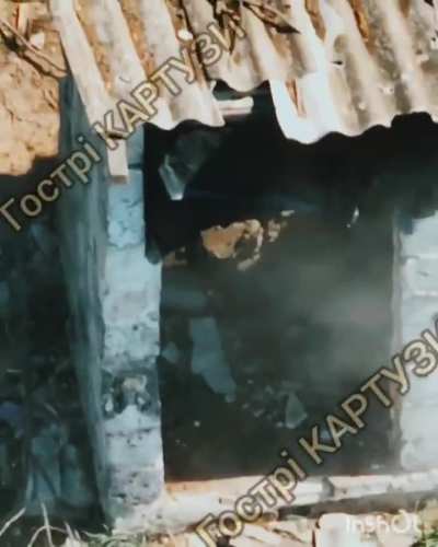 A russian falls into an outhouse pit after being struck by a dropped munition.
