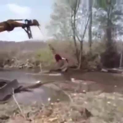 WCGW using a backhoe to try and make the water.