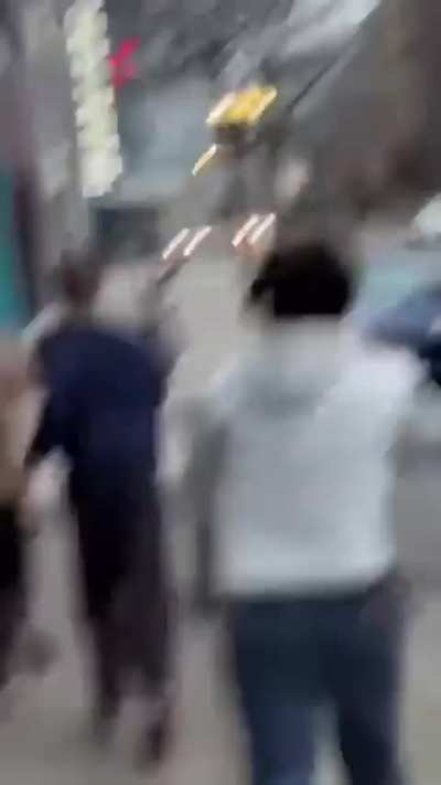 Josh running from filming crowd in Detroit 