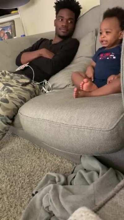 This baby having a full conversation with daddy