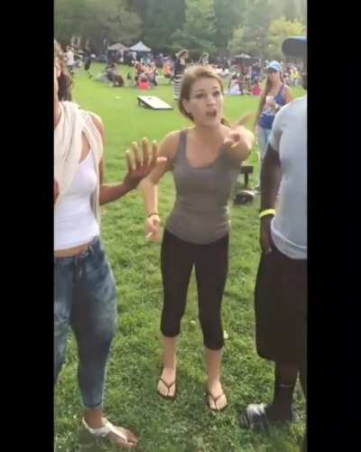 White woman calls a black guy the n-word, then spits on his wife at a fair in Chicago 