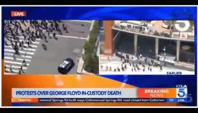 LA cop car rams protester on live TV chopper camera