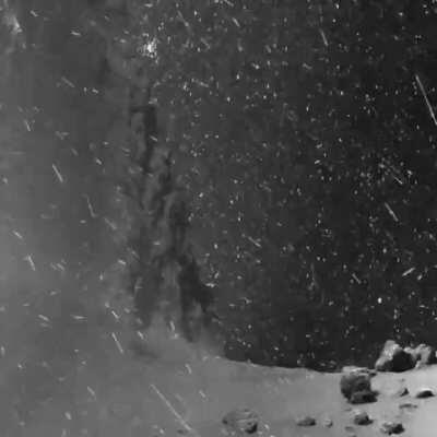 Dust, stars, and cosmic rays swirling around Comet 67P/Churyumov–Gerasimenko, captured by the Rosetta probe.