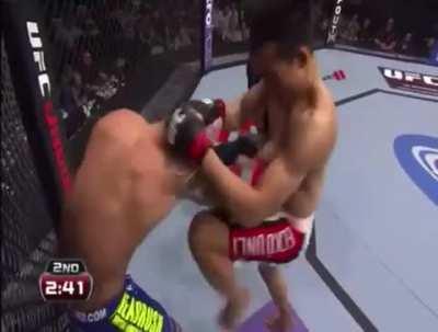 The Korean Zombie reverses a double leg takedown from Dustin Poirier