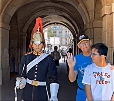 Father makes sure his autistic son doesn't get too close or touch the royal guard and then this happens...