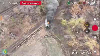 Destruction of a Ukrainian Kozak by drone drop grenades