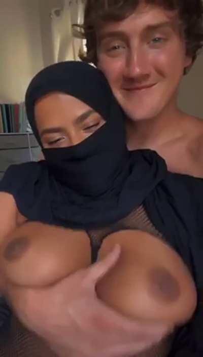 You can see her smile despite the veil