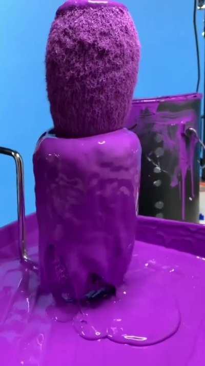 Paint being squeezed off