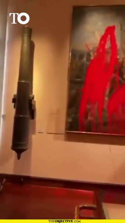 Activists damage Colombus painting in protest against Colombus day