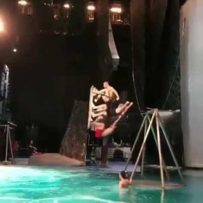 Triple flip off a pendulum swing