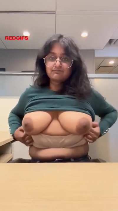 Indian girl showing her boobs in office