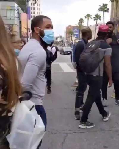 “Influencer” posing at a protest