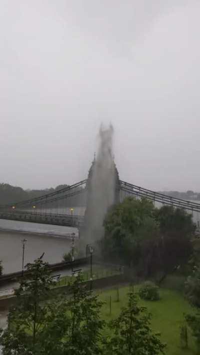Pipe bursting by Hammersmith Bridge during yesterday's storm
