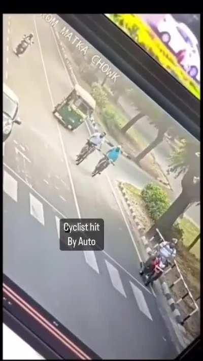 Absolute outrageous driving by the auto. Please wear helmets!! 