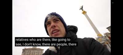 Spanish young lad can't hold back tears as he walks in Maidan Square