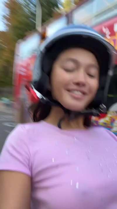Lily Chee riding with no bra 