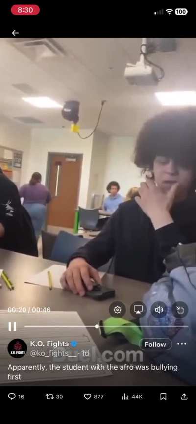 Apparently, the student with the Afro was bullying first