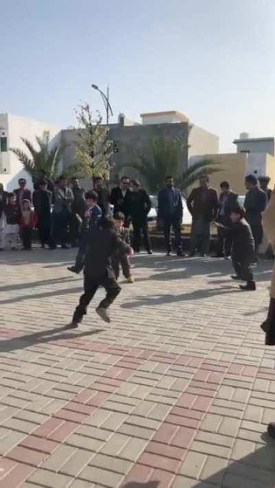 Khattak boys performing attan