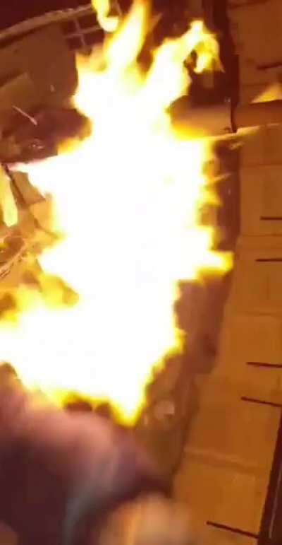 Firebreathing using sanitizer and a burning oven.